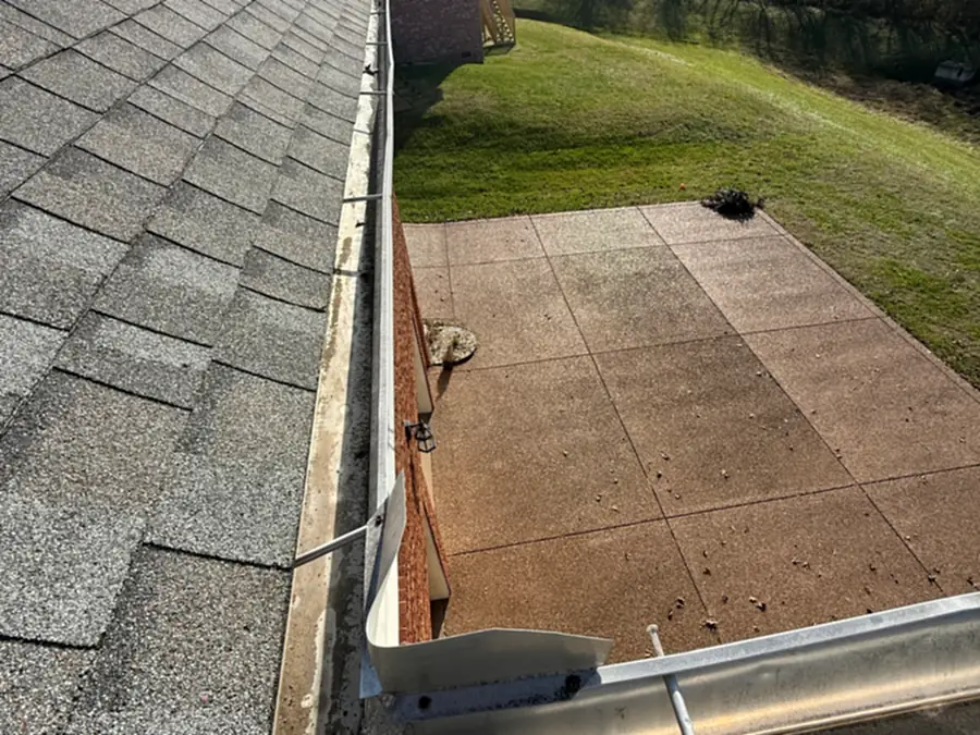 A cleared gutter run on a Nashville home after a Camelot gutter cleaning